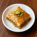 Baklava dessert with honey and pistachios - Halal Mediterranean sweets Boston